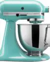 The KitchenAid Artisan Stand Mixer Series 5 Quart Tilt-Head with Pouring Shield (model KSM150PS) in Aqua Sky is a versatile and indispensable tool for any kitchen.