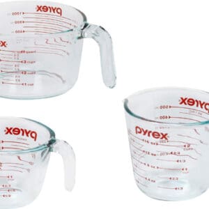 The Pyrex Glass Measuring Cup Set comprises three essential pieces: a 1-cup, 2-cup, and 4-cup measuring cup, each meticulously designed to cater to various culinary needs.